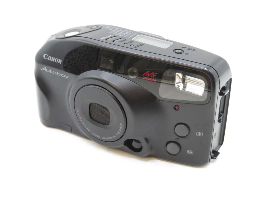 IMG_3247 A black Canon Autoboy film camera with visible lens, flash, and various control buttons.