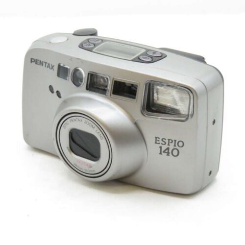 A silver Pentax Espio 140 film camera with a zoom lens and built-in flash.