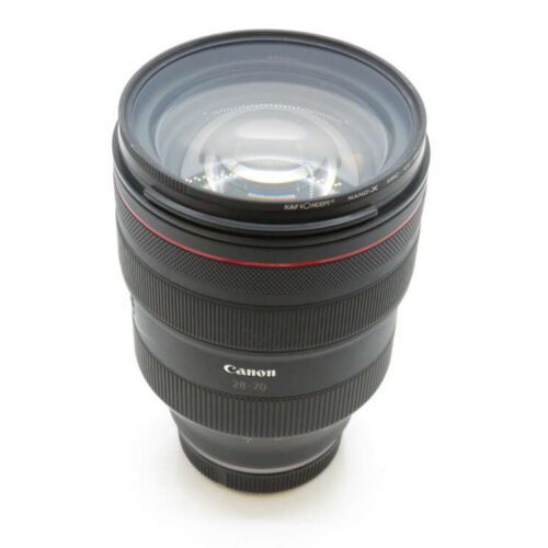 A Canon 28-70mm camera lens with a wide front element and visible control rings.