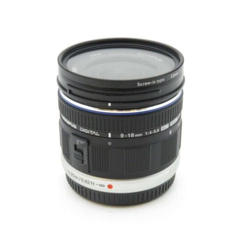 A zoom camera lens with a focal range of 9-18mm and a 1:4-5.6 aperture.