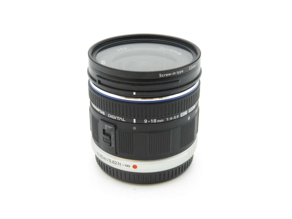 IMG_3457 A zoom camera lens with a focal range of 9-18mm and a 1:4-5.6 aperture.