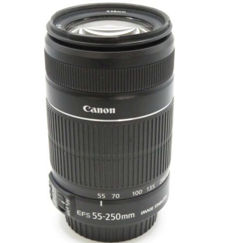 A black Canon EFS 55-250mm camera lens with image stabiliser, featuring a zoom ring and focus switch.