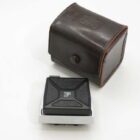 A vintage camera accessory with a leather case, featuring a black and silver design with a textured surface and a logo.
