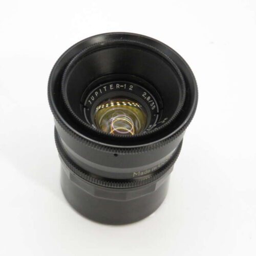 Black camera lens with the label "Jupiter-12 2/35" visible on the front element.
