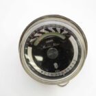 A vintage Sekonic Marine Meter with a round face and measurement markings around the edge.