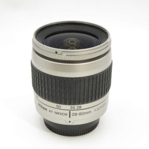 A Nikkor 28-80mm camera lens with a textured grip and clear markings for focus and zoom ranges.