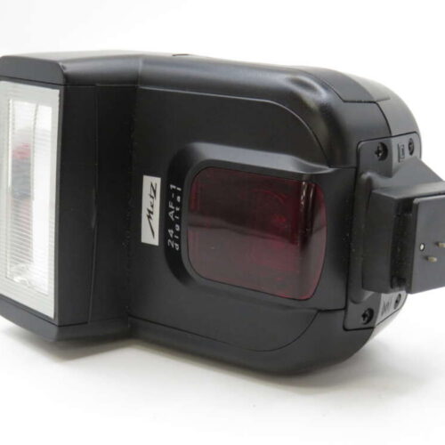 A black electronic camera flash unit with a red sensor panel and attachment points for connecting to a camera.