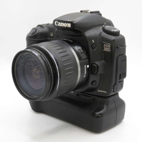 A Canon EOS 20D DSLR camera with an attached zoom lens, positioned against a plain white background.