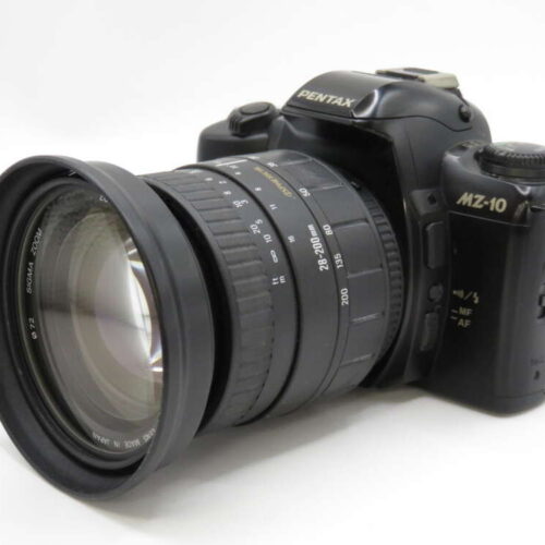 Pentax MZ-10 camera with a large zoom lens attached, viewed from the side.