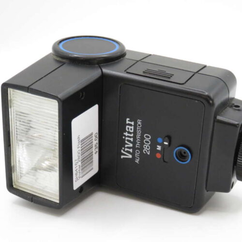 A vintage Vivitar Auto Thyristor 2800 flash unit with a rectangular flash head and control buttons on the side.