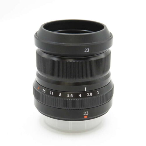 A black camera lens with a focus ring and aperture markings from F16 to F1.4, labelled with the number 23.