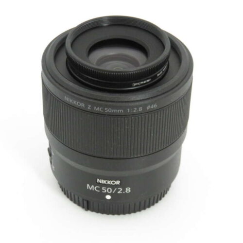 Nikon NIKKOR MC 50mm f/2.8 camera lens with focus and aperture rings.