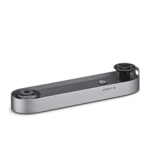 Silver Leica camera accessory with a compact, minimalist design and marked "Leicavit M," featuring two circular knobs.